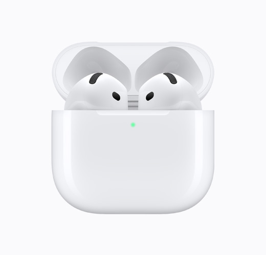 AirPods 4 inside an open white charging case