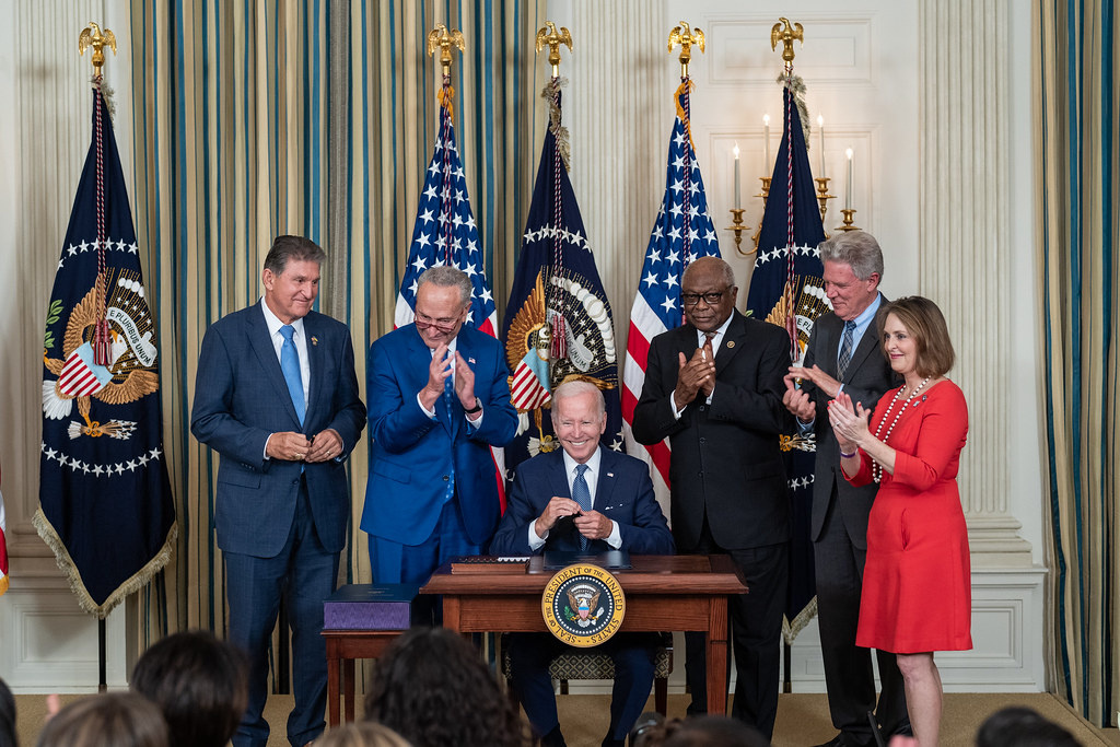President Joe Biden signs H.R. 5376, the βInflation Reduction Act of 2022β, Tuesday, August 16, 2022, in the State Dining Room of the White House. (Official White House Photo by Cameron Smith)