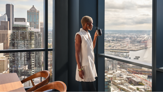 Businesswomen looking out the office window